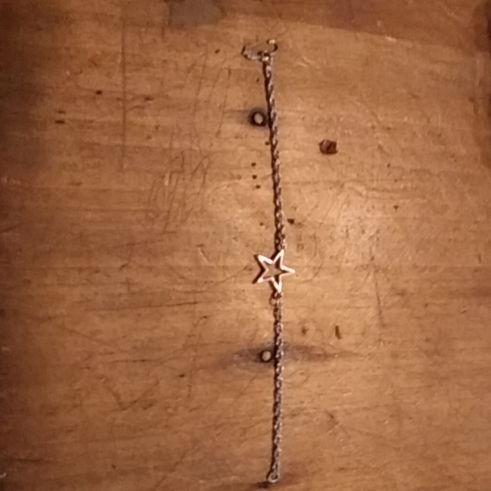 Silver tone star bracelet
